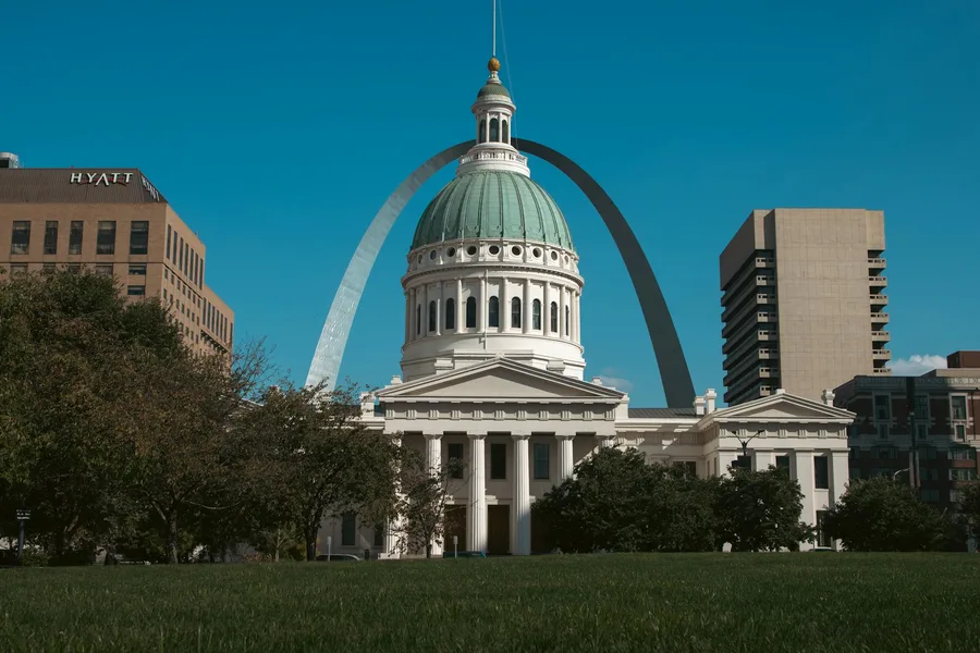 The old courthouse in St. Louis with the iconic Gateway Arch in the backdrop.