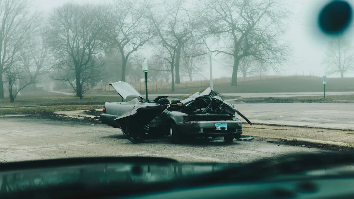 A foggy morning with a severely damaged car on a deserted street in Chicago.
