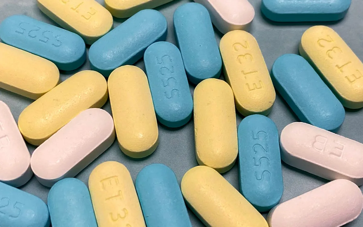Close-up image of various colored pharmaceutical pills. Ideal for medical and healthcare topics.