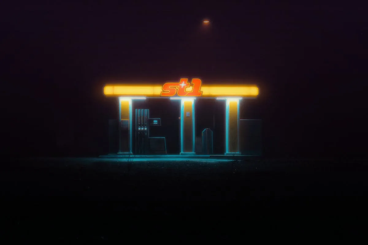 A glowing neon-lit gas station creating a mysterious aura under the night sky.
