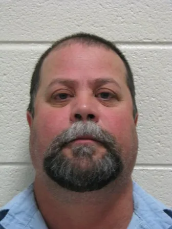 Registry photo of Gary June Caughron