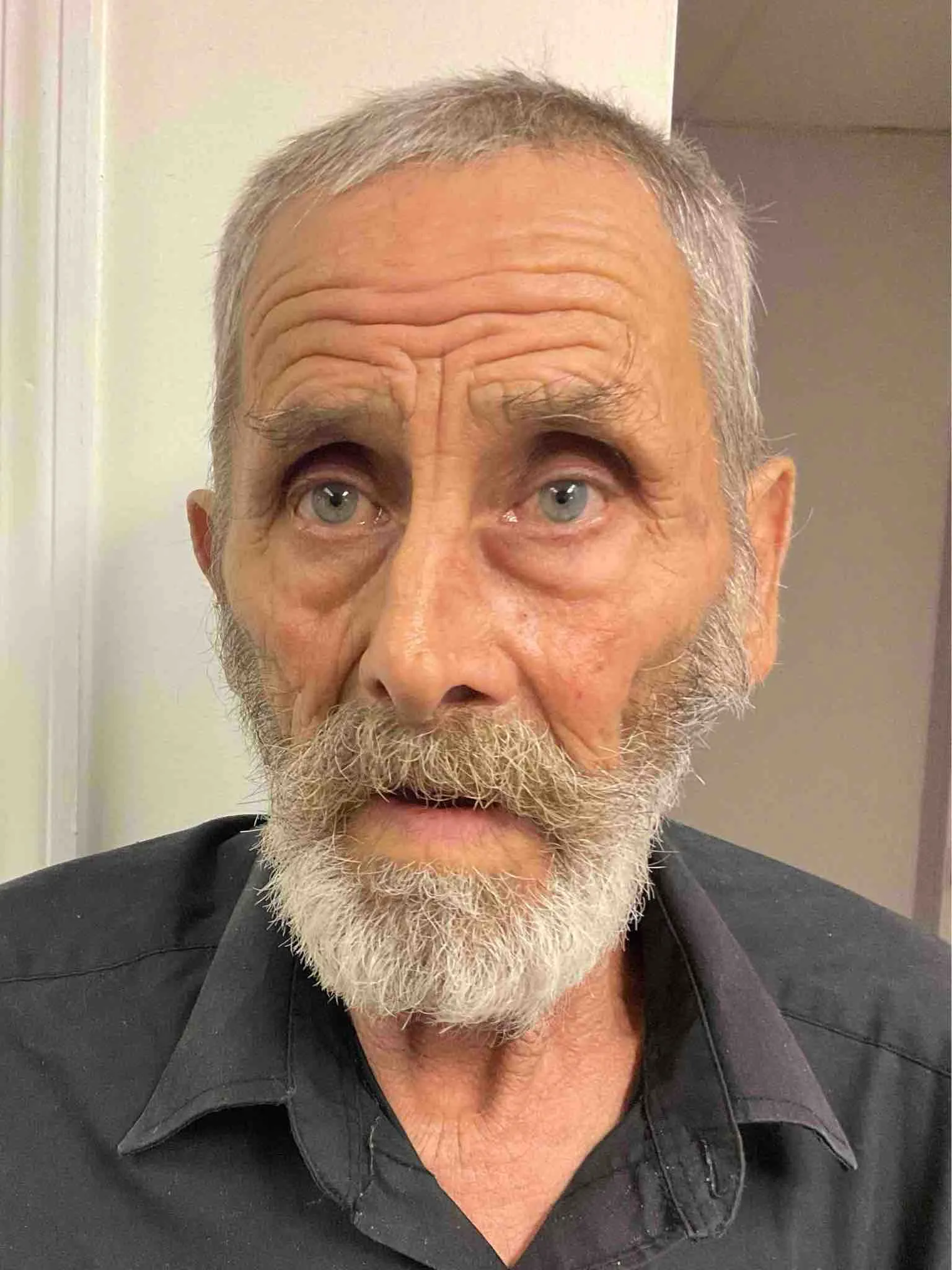 Registry photo of Carlos Junior Poe