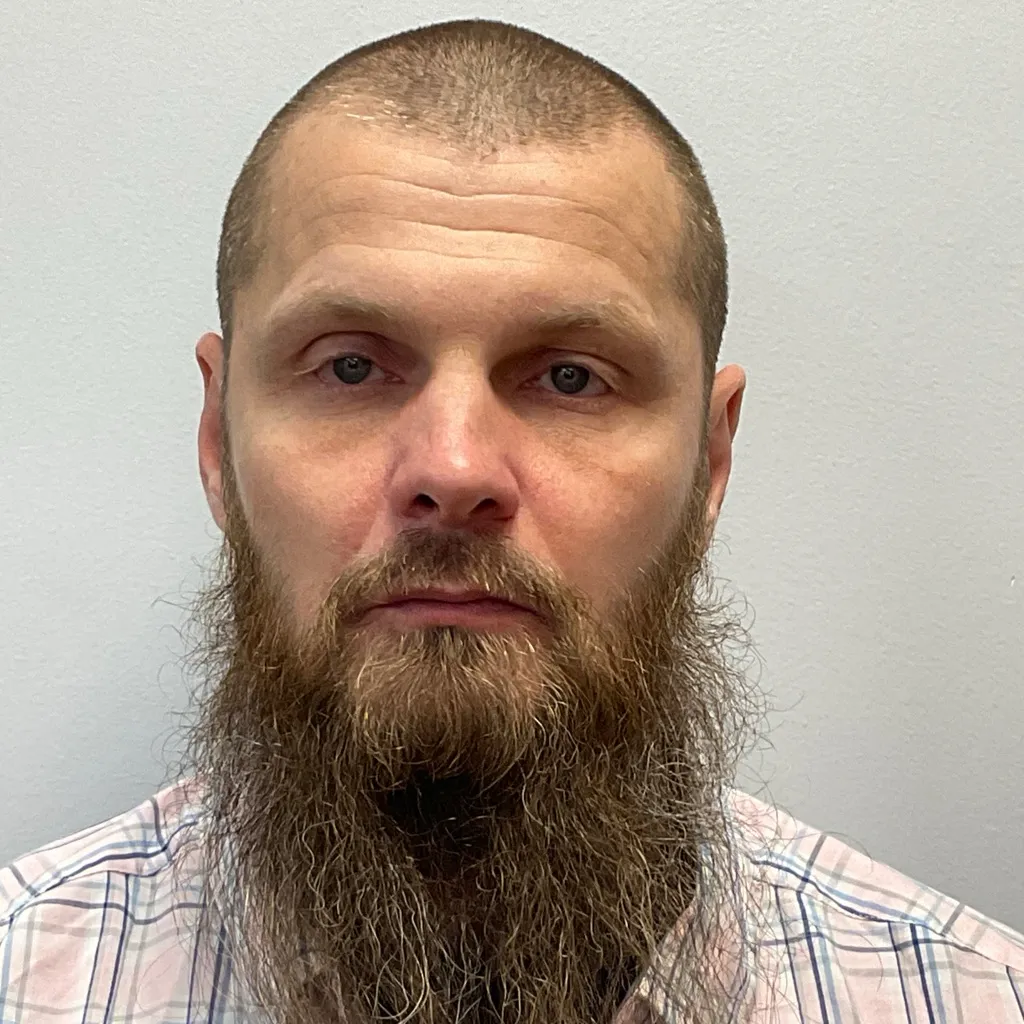 Registry photo of John Paul Rowe