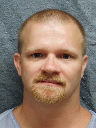 Registry photo of Warren Curnutt