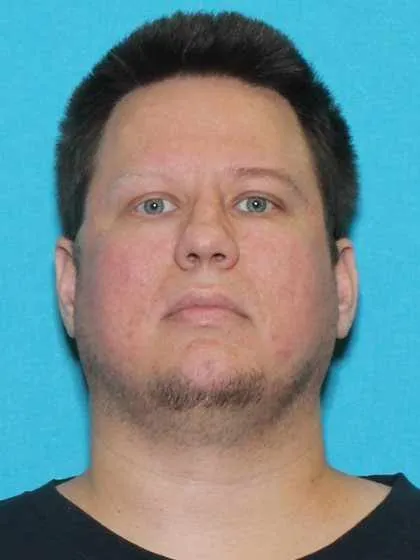 Registry photo of John W Haskins