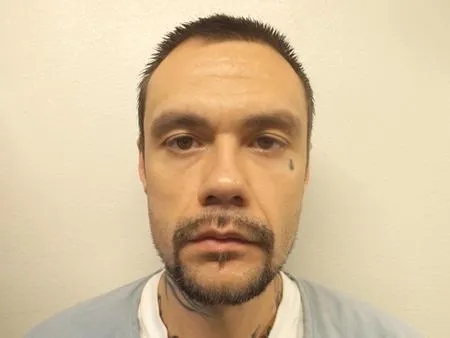 Registry photo of Travis Edwin Griggs