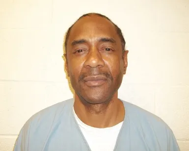 Registry photo of Johnny Tate