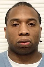 Registry photo of Carlton Manuel