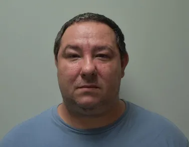 Most recent booking photo for Justin Wayne Agent