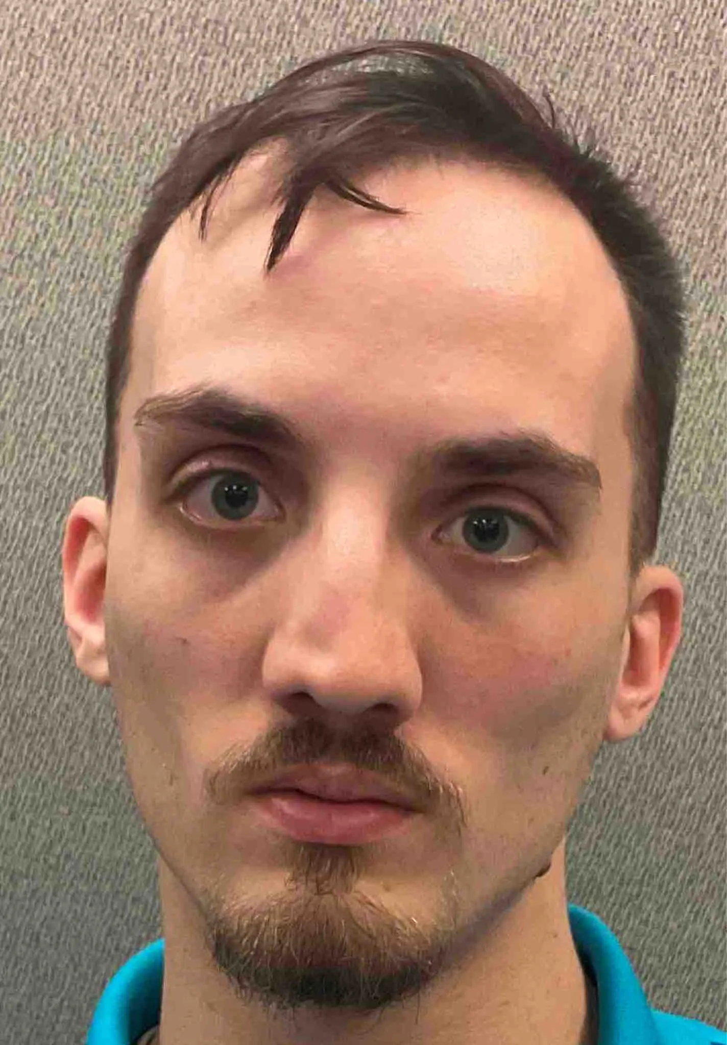 Registry photo of Timothy Logan Wollas