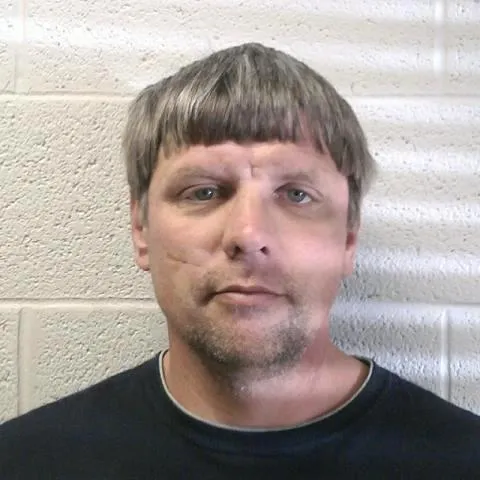 Registry photo of Marcus Edwin Cox