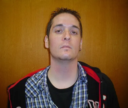 Registry photo of Sima Richard Solmoson