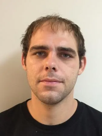 Registry photo of Justin Leo Nichols