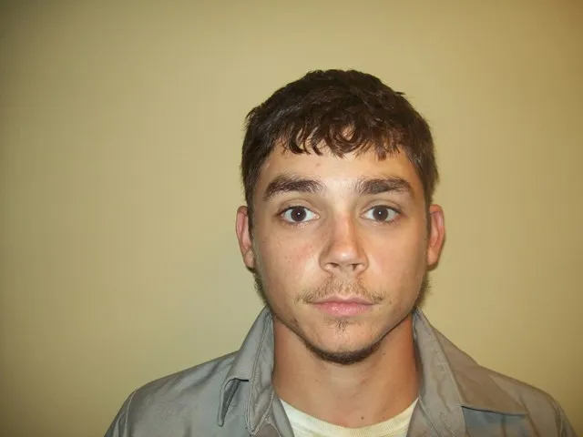 Registry photo of Travis Neil Pusser