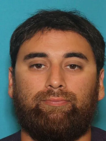 Registry photo of Adan Josiah Ayala