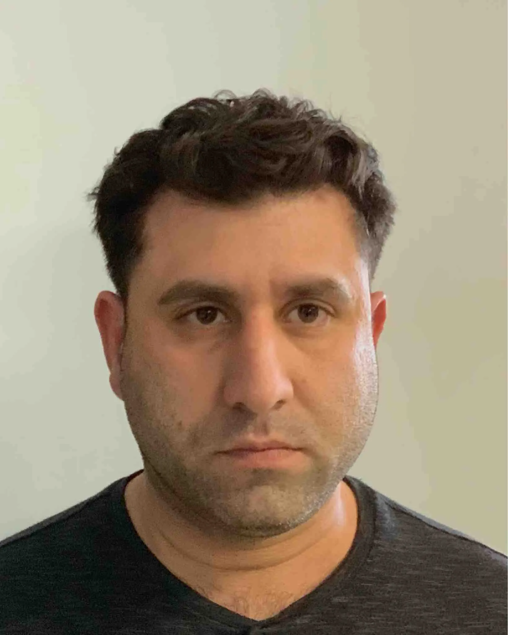 Registry photo of Wasen Isam Hannosh