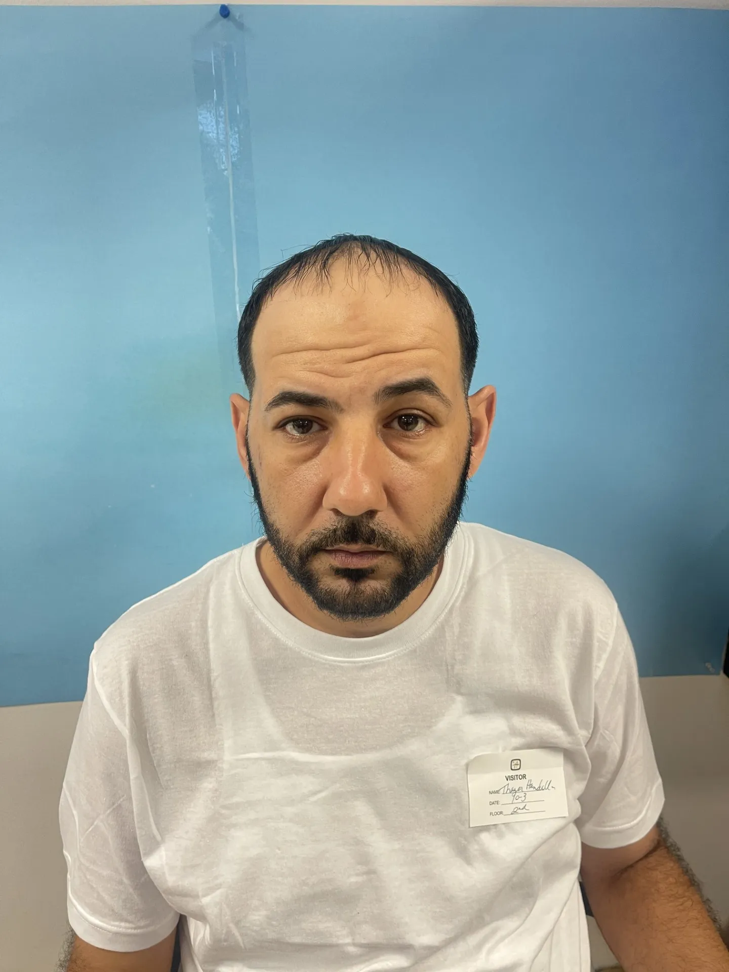 Registry photo of Thayer Mokles Hamdalla