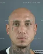 Booking photo of Gilbert Florez Vega, Anderson County, Oct 10, 2013