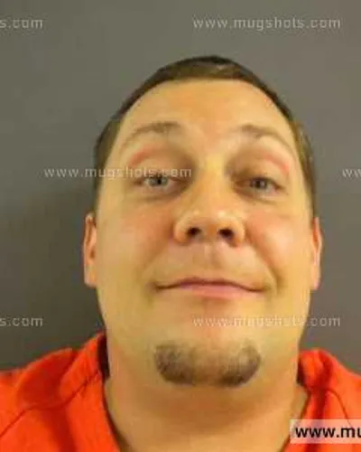 Booking photo of Devon Noel Reed, Anderson County, Sep 25, 2013