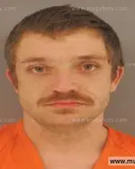 Booking photo of Dustin Alan Braden, Anderson County, Mar 4, 2014
