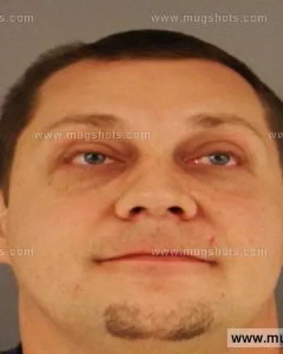 Booking photo of Devon Noel Reed, Anderson County, Aug 17, 2014