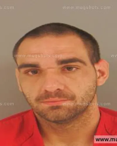 Booking photo of Justin Bartell Price, Anderson County, Aug 14, 2015