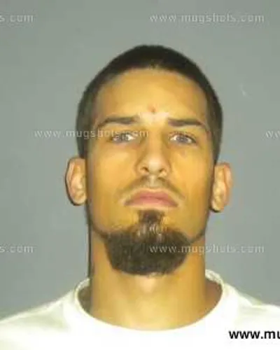 Booking photo of Derek Alan Ely, Anderson County, Aug 27, 2013