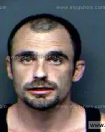 Booking photo of Travis Michael Elliott, Anderson County, Jul 30, 2012