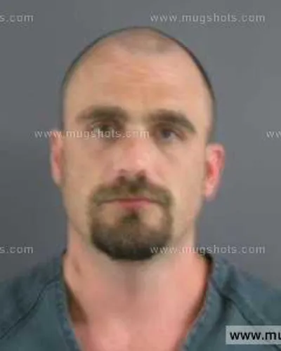 Booking photo of Travis Michael Elliott, Anderson County, Oct 10, 2013