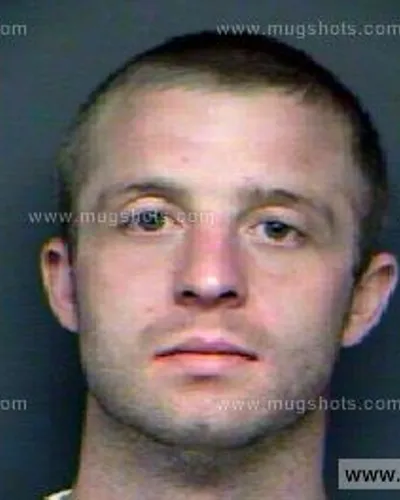 Booking photo of Justin Huskey, Anderson County, Aug 3, 2011