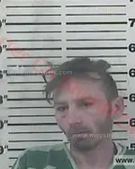 Booking photo of Travis Gene Belcher, Carter County, Feb 27, 2018