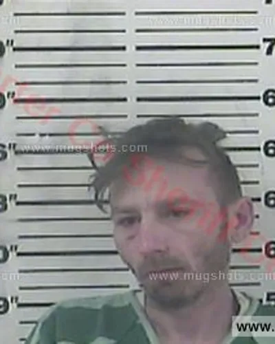 Booking photo of Travis Gene Belcher, Carter County, Feb 27, 2018