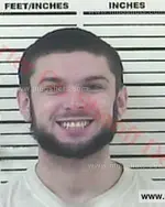 Booking photo of Devon Miles Guinn, Carter County, Nov 12, 2016