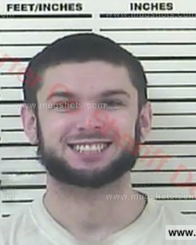 Booking photo of Devon Miles Guinn, Carter County, Nov 12, 2016