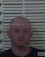 Booking photo of Aaron Paul Milhorn, Carter County, Aug 17, 2013