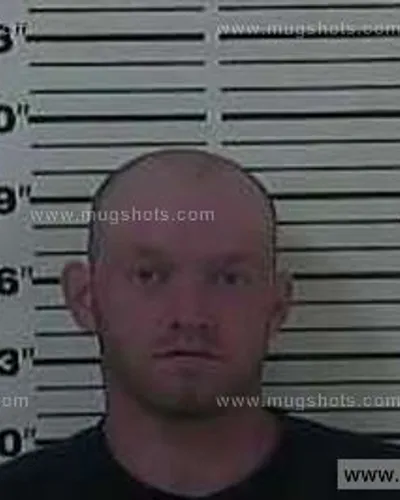 Booking photo of Aaron Milhorn, Carter County, Aug 17, 2013