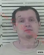 Booking photo of DUSTIN J GARLAND, Carter County, Mar 29, 2017