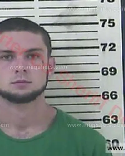 Booking photo of Devon Miles Guinn, Carter County, Sep 27, 2015