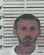 Booking photo of Travis Gene Belcher, Carter County, Sep 26, 2016