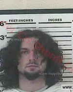 Booking photo of Devon Miles Guinn, Carter County, Jun 5, 2018