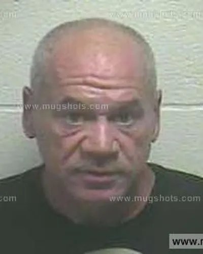 Booking photo of Douglas Enich Risner, Giles County, Aug 25, 2013